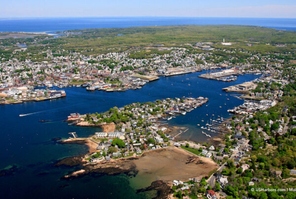 Photo of Gloucester Harbor shot from a plane giving a birds-eye-view of the notable fishing harbor.