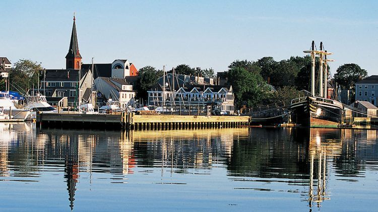 Salem harbor as seen from a motorboat off the shore.