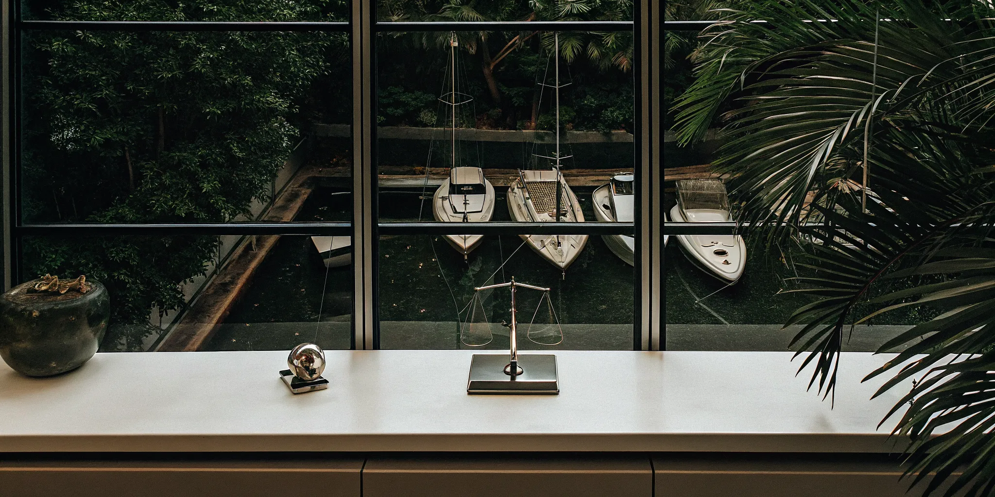 Boats docked at a marina, available via a boat rental or subscription.