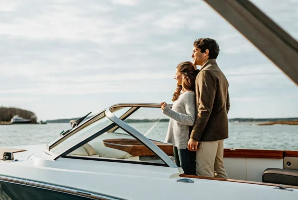 Couple considering the annual cost of owning a boat in Massachusetts