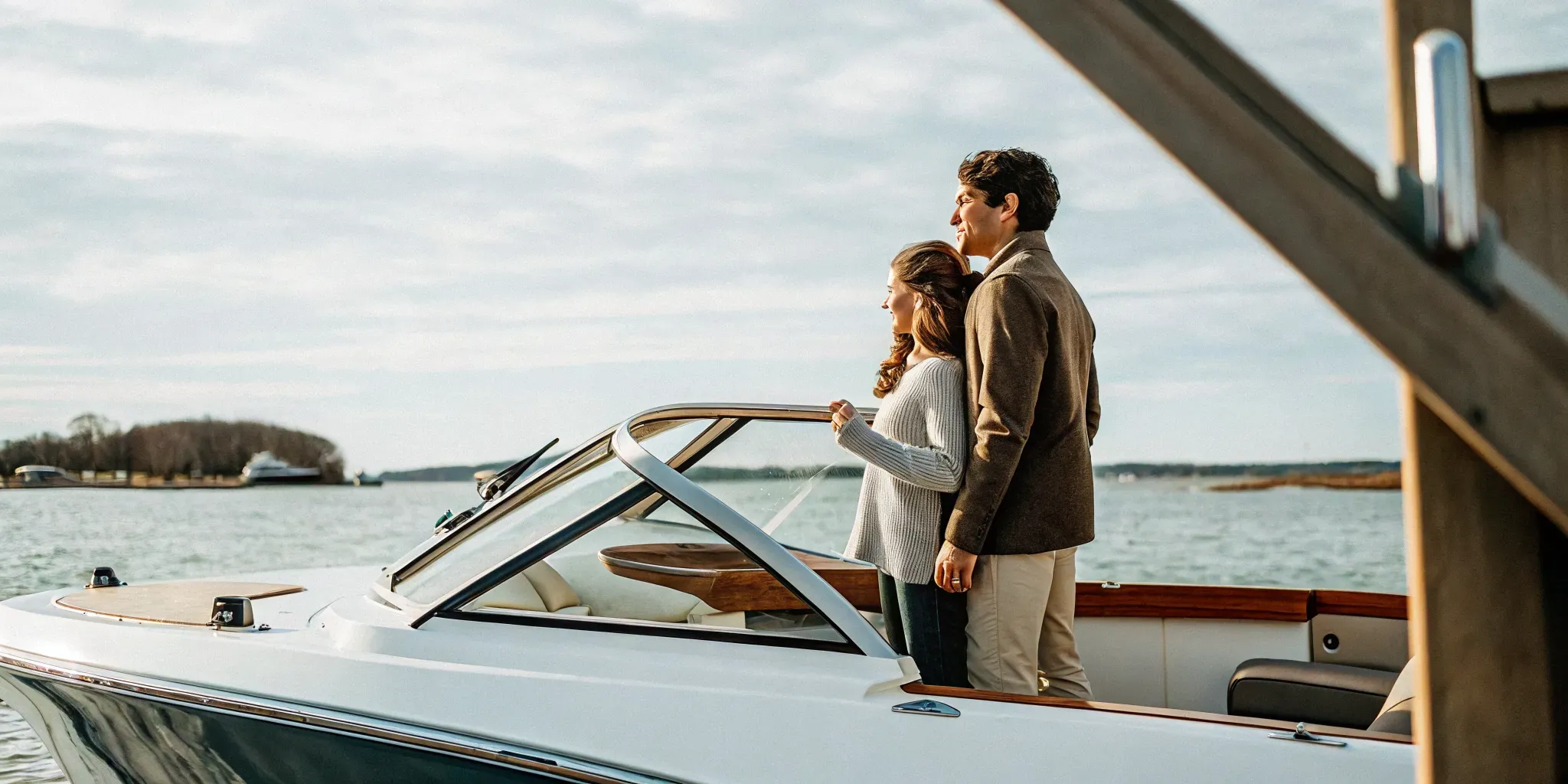 Couple considering the annual cost of owning a boat in Massachusetts